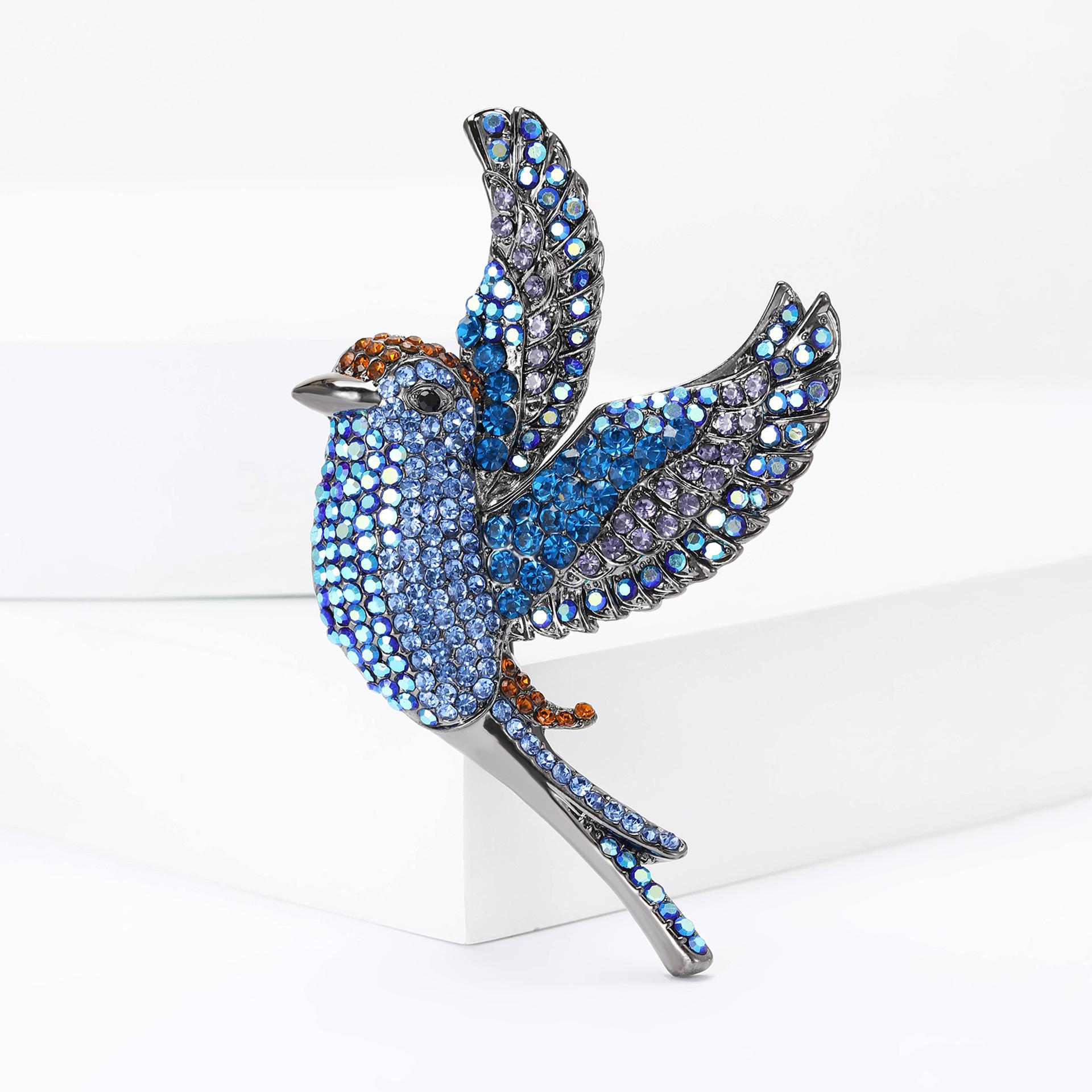 

Новая высококачественная брошь в виде птицы из сплава со стразами, прочный изысканный женский костюм, кардиган, нагрудный цветочный аксессуар синий