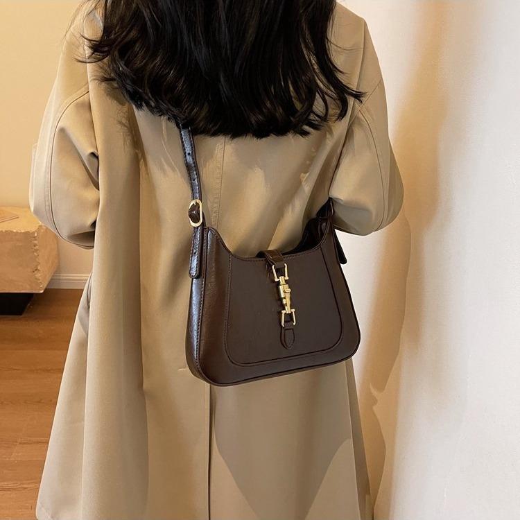 

Нишевая подмышечная маленькая сумка женская 2025 новая сумка почтальона темперамент женская сумка-мессенджер с замком чёрный