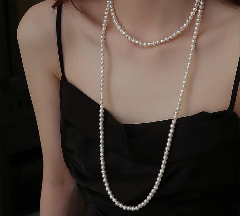 Elegant Silver Pearl Necklace: High-End Design for Women - Versatile and Chic Clavicle Accessory.