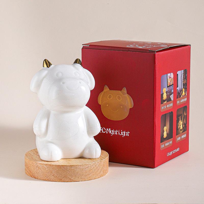 Internet celebrity ceramic atmosphere night light cute little cow led light household bedroom bedside children's room lamp