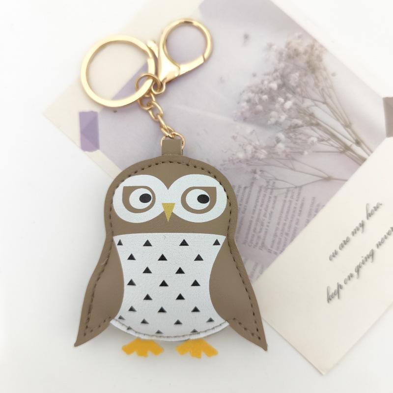 

Adorable Owl Keychain: Creative Bag Pendant with Printable PU Pattern and Cotton Fill.