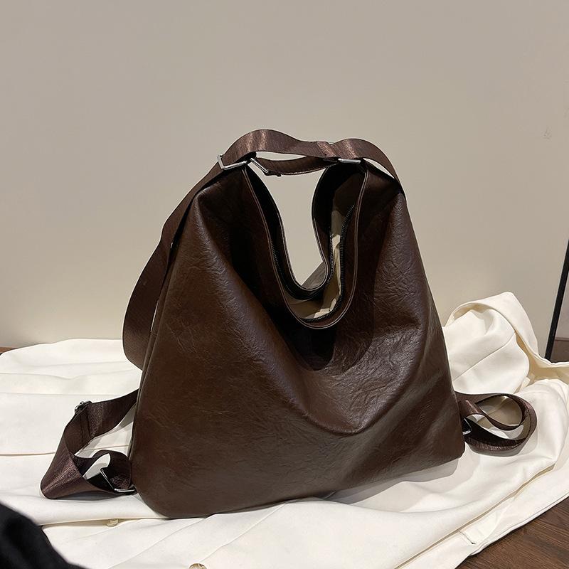 

Косая сумка через плечо студенческая ретро 2025 новая женская сумка большая вместимость сумка модный рюкзак сумка-тоут