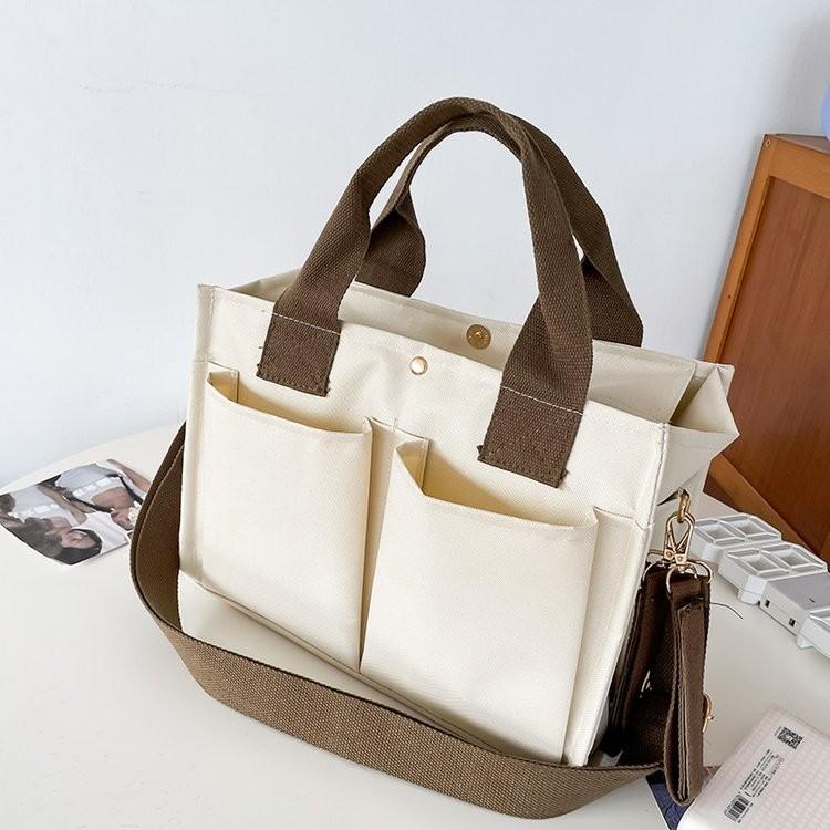 

Canvas Stylish Tote Bag For Women In Cream Color With Multi Pocket Design For Everyday Use