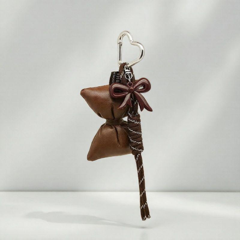 

Yogodlns Милый мини-рюкзак с бантом из искусственной кожи, подвеска для сумки, подвеска для сумки, аксессуары для сумок one size коричневый