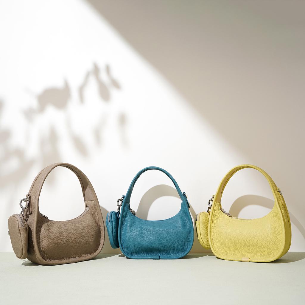 Neue kleine Tasche, Premium-Handtasche, Ein Schulter, Unterarm-Crossbody-Halbmondtasche, Kopfhörertasche.