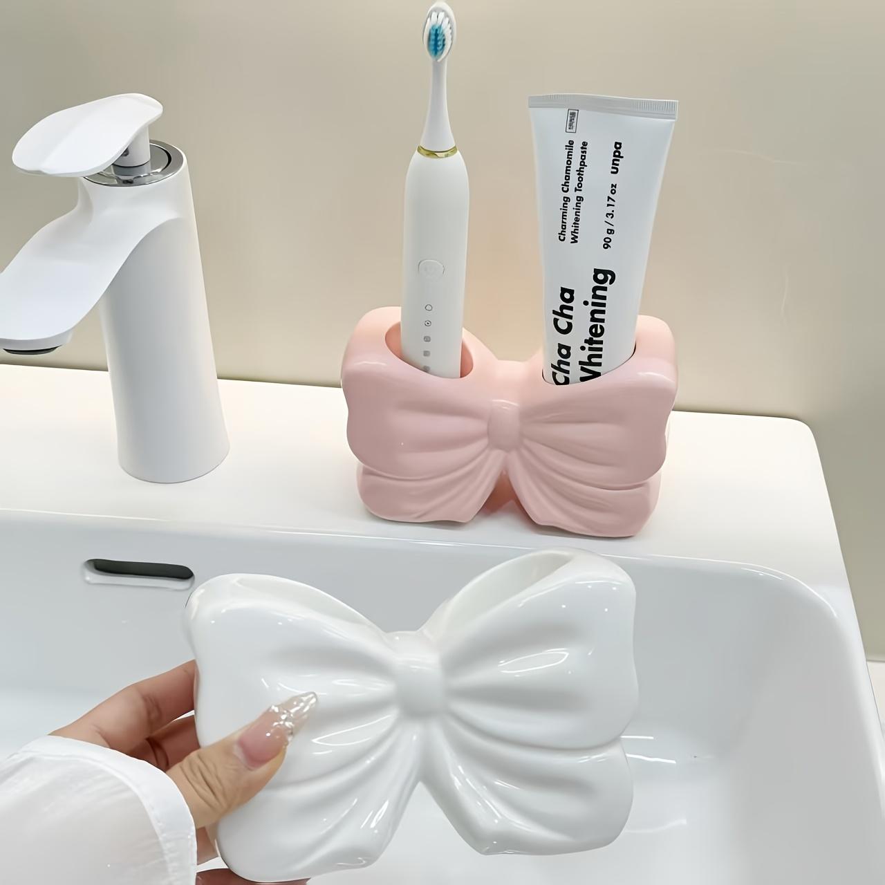 

Visually Appealing Ceramic Toothbrush Holder with Bow Design Moisture-Resistant Bathroom Organizer, Freestanding Modern Vanity Decor for Countertop, білий
