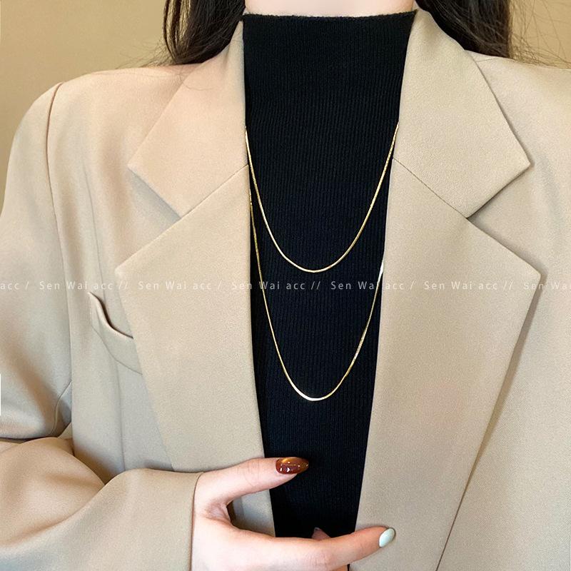 

Long stacked gold snake bone necklace women s sweater chain 2026 new light luxury niche collarbone chain accessories