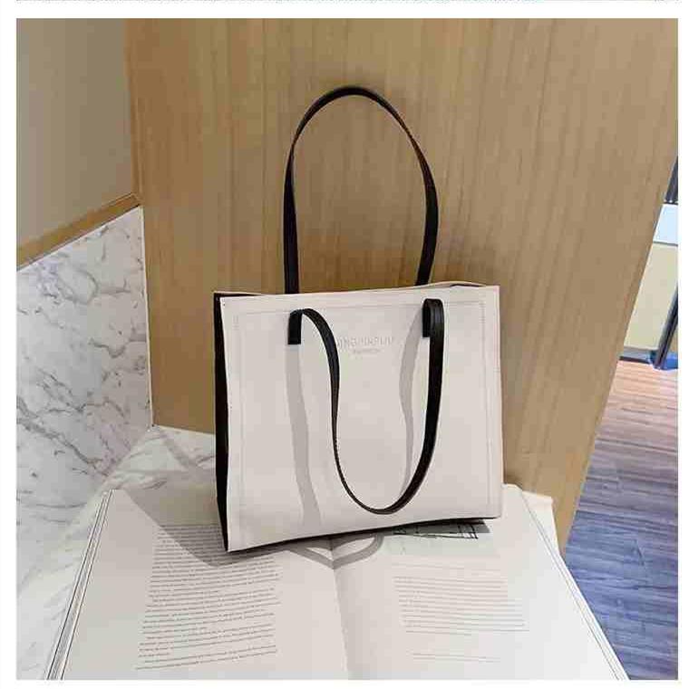 Женская однотонная большая вместительная сумка-тоут для отдыха из искусственной кожи — фото 13