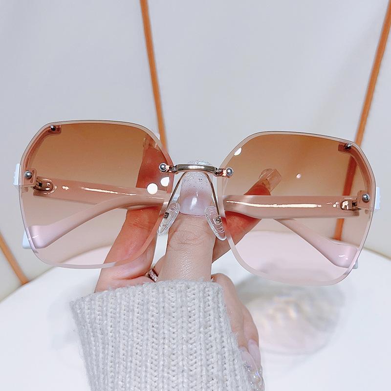 

Солнцезащитные очки без оправы, металлическая отделка, текстурированные ножки из поликарбоната, простые очки Uv400 Regular