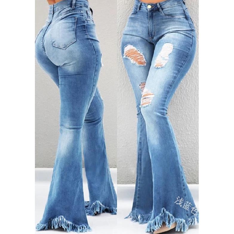 

Fashionable new distressed ripped high-waisted jeans with frayed edges and a slimming effect, slightly flared denim pants for women S светло-синий