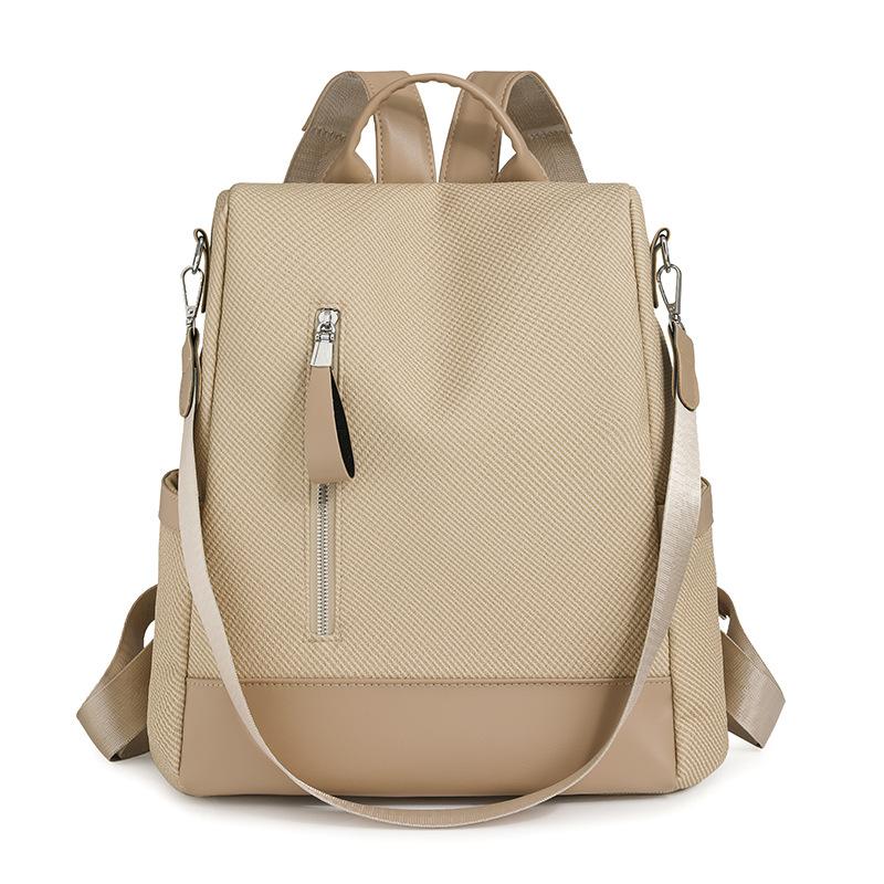 Schoolbag backpack women pu fabric texture commuting large capacity waterproof travel anti-theft backpack niche retro Baigou bag