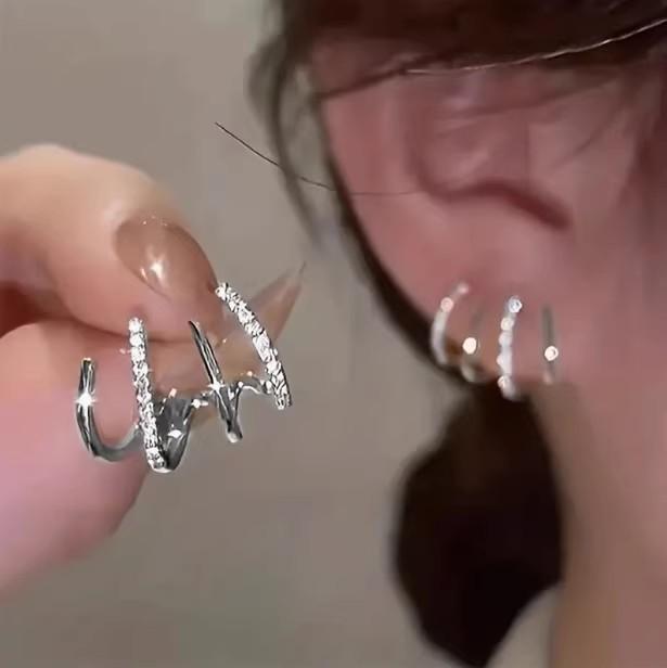 Vier-Krallen-Ohrreihen-Ohrringe Design fortschrittlicher Sinn Internet-Berühmtheit Diamant-Steckohrringe s111 Silbernadel Temperament neue trendige Ohrringe