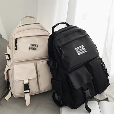 Un carico di multi-tasche per uomini e donne universale in nylon grande capacità tempo libero semplice zaino scuola inserto fibbia computer zaino