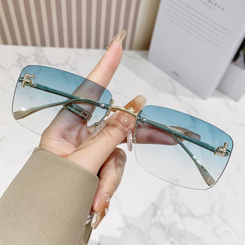 Ruiao rimless sunglasses UV400 fashion square metal glasses for women luxury brand designer diamond y2k small face sun glasses
