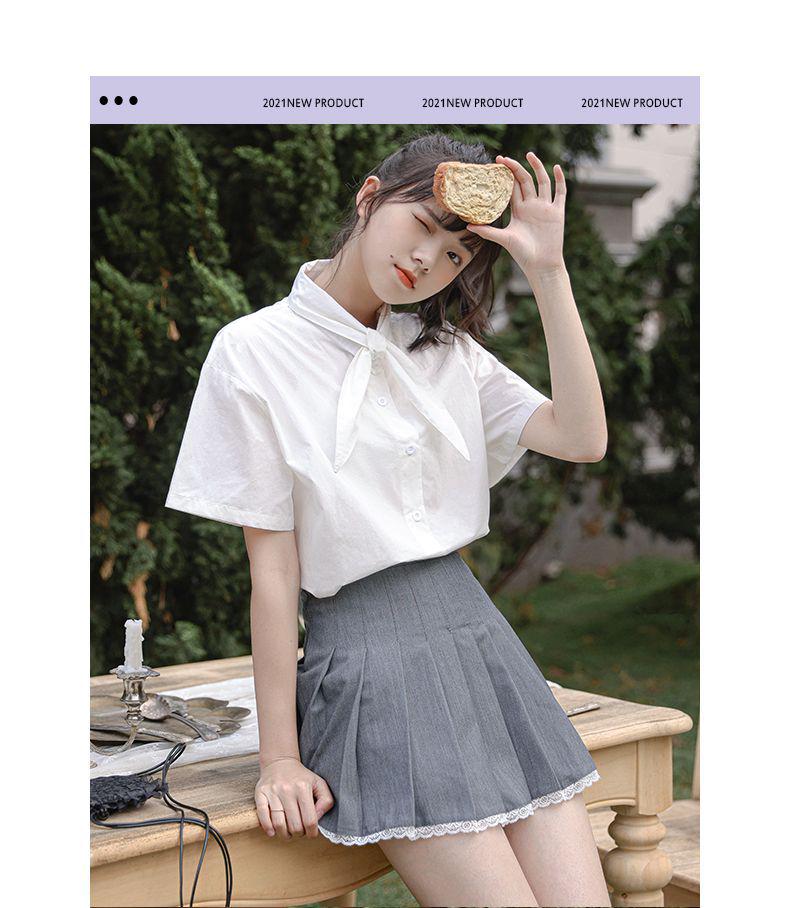 Biała damska letnia japońska koszula mundurkowa studencka o luźnym kroju z kołnierzykiem typu lalka