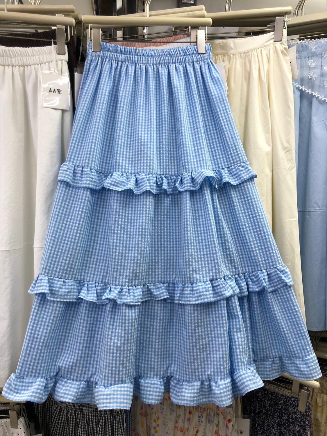 

Real shot 2025 spring romantic gentle wind heavy industry pleated splicing medium and long a-shaped big swing skirt half-body umbrella skirt average size
