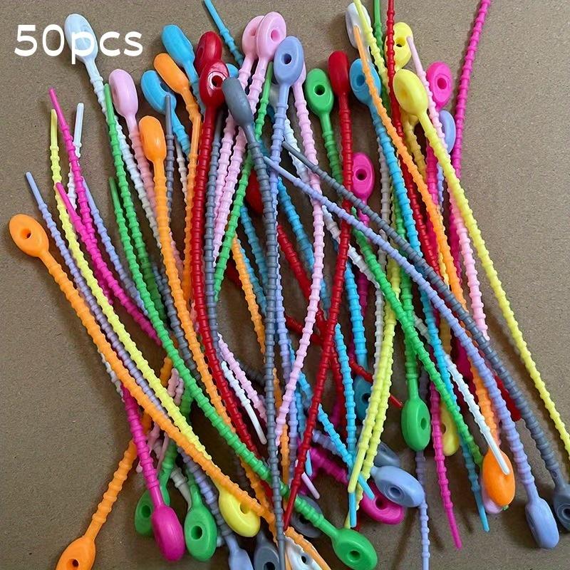 

Reusable silicone cable organizer - cable ties, zipper pockets, and twisted straps for neat wire and cable management 20pcs