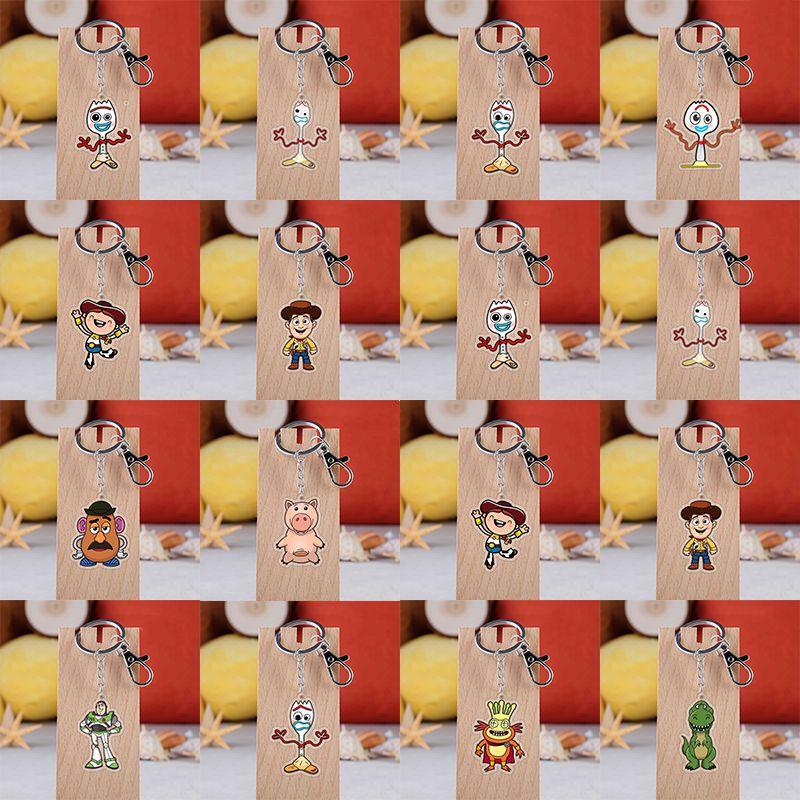 Entzückender Toy Story Acryl-Schlüsselanhänger mit Buzz Lightyear, Woody und Alien Design