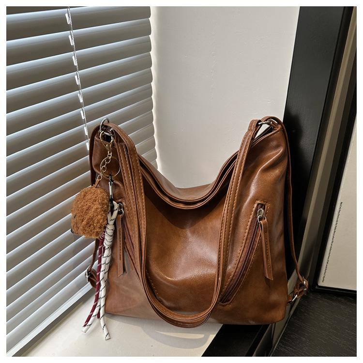 

Корейский нишевый дизайн женский модный рюкзак 2024 - большая вместимость, на плечо и сумка-тоут для поездок на работу Without Pendant темно-коричневого