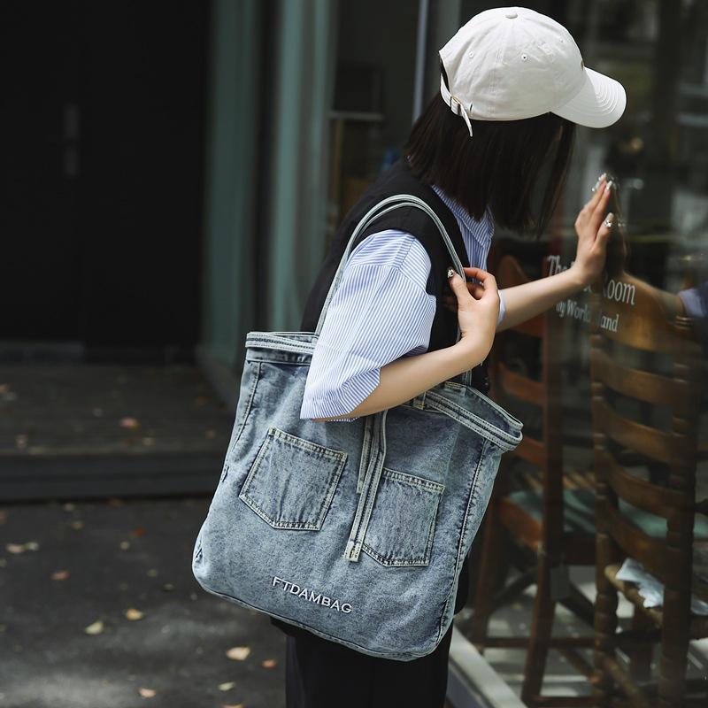 Stylish Denim Tote Bag for Women – Classic Jeans Design with Front Pockets and Embroidered Logo, Perfect for Casual Use