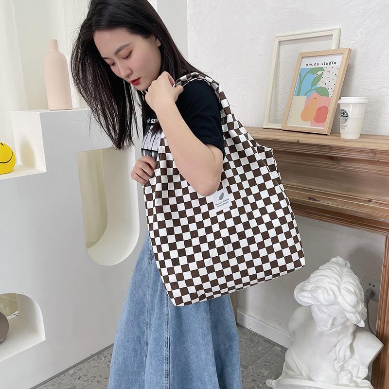New shoulder portable large-capacity canvas bag summer women's bag simple checkerboard college style shopping bag