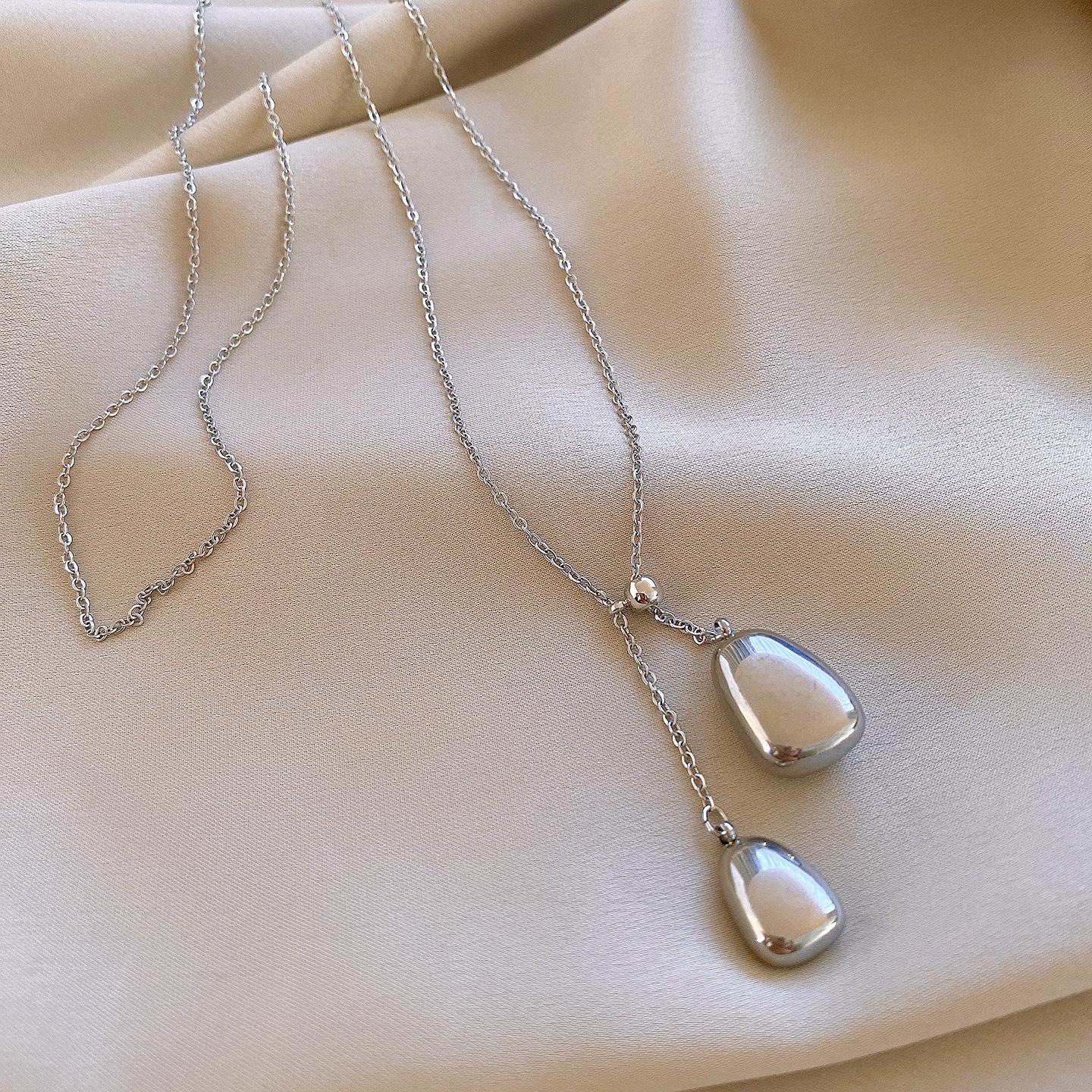 

Stainless steel Korean ins water drop tassel necklace accessories women s simple sweater chain accessories