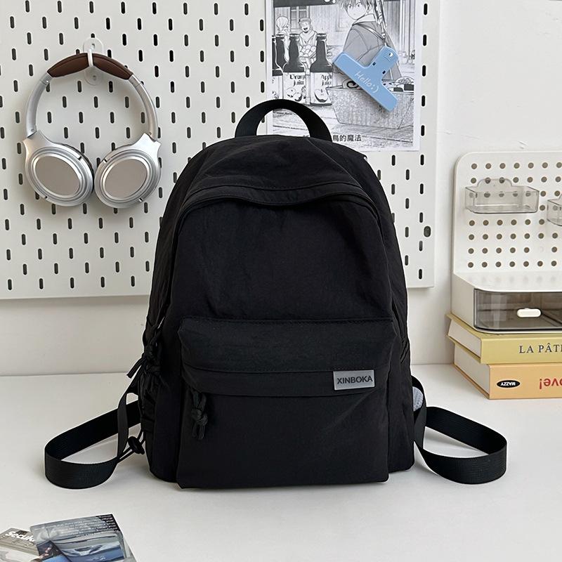 

Backpack men s and women s simple large-capacity travel backpack couple leisure junior high school student high school college student schoolbag чёрный