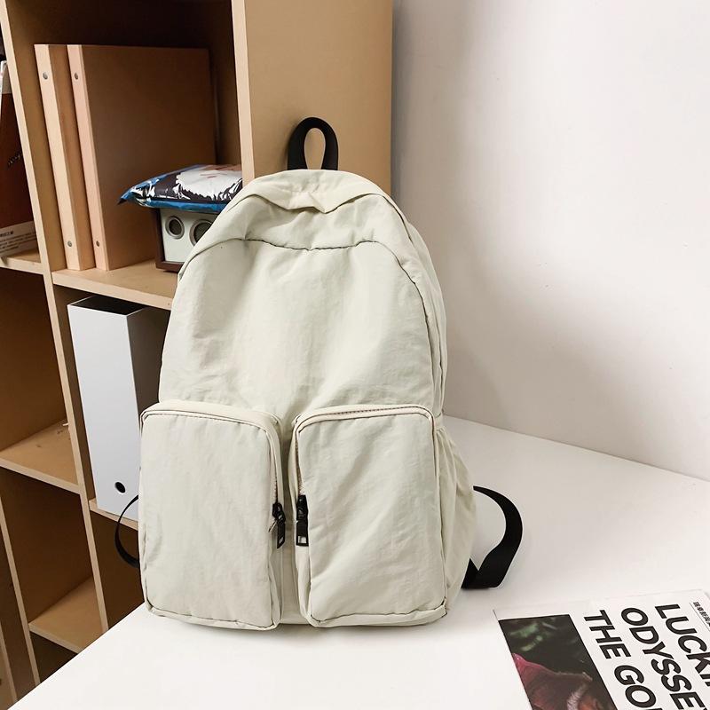 Schoolbag niche new backpack women's fashion versatile college student large capacity backpack Korean version casual light travel bag