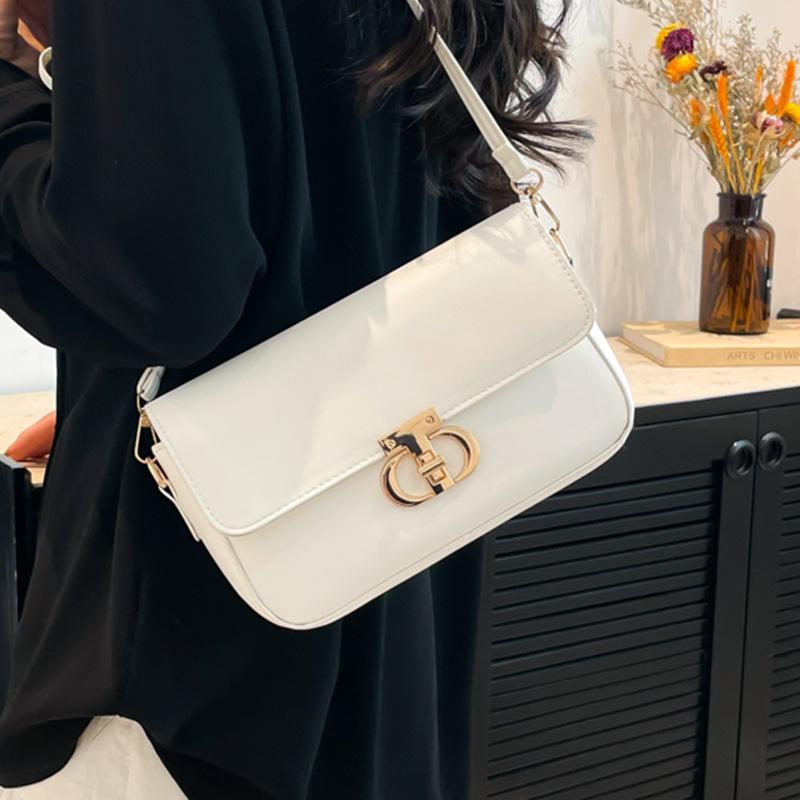 2025 einfarbige PU trendige personalisierte tägliche kleine Tasche einfache Damenhandtasche Umhängetasche Crossbody-Tasche Metallschnalle Damenhandtasche