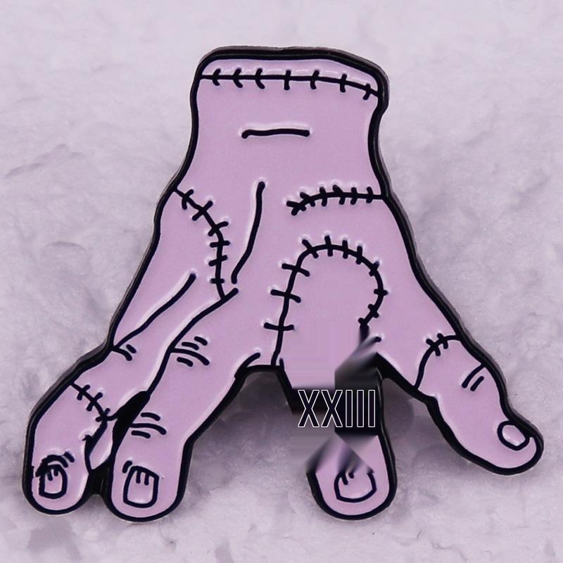 Wednesday Addams Hand Enamel Pin: Horror Anime Metal Badge and Movie Fan Accessory