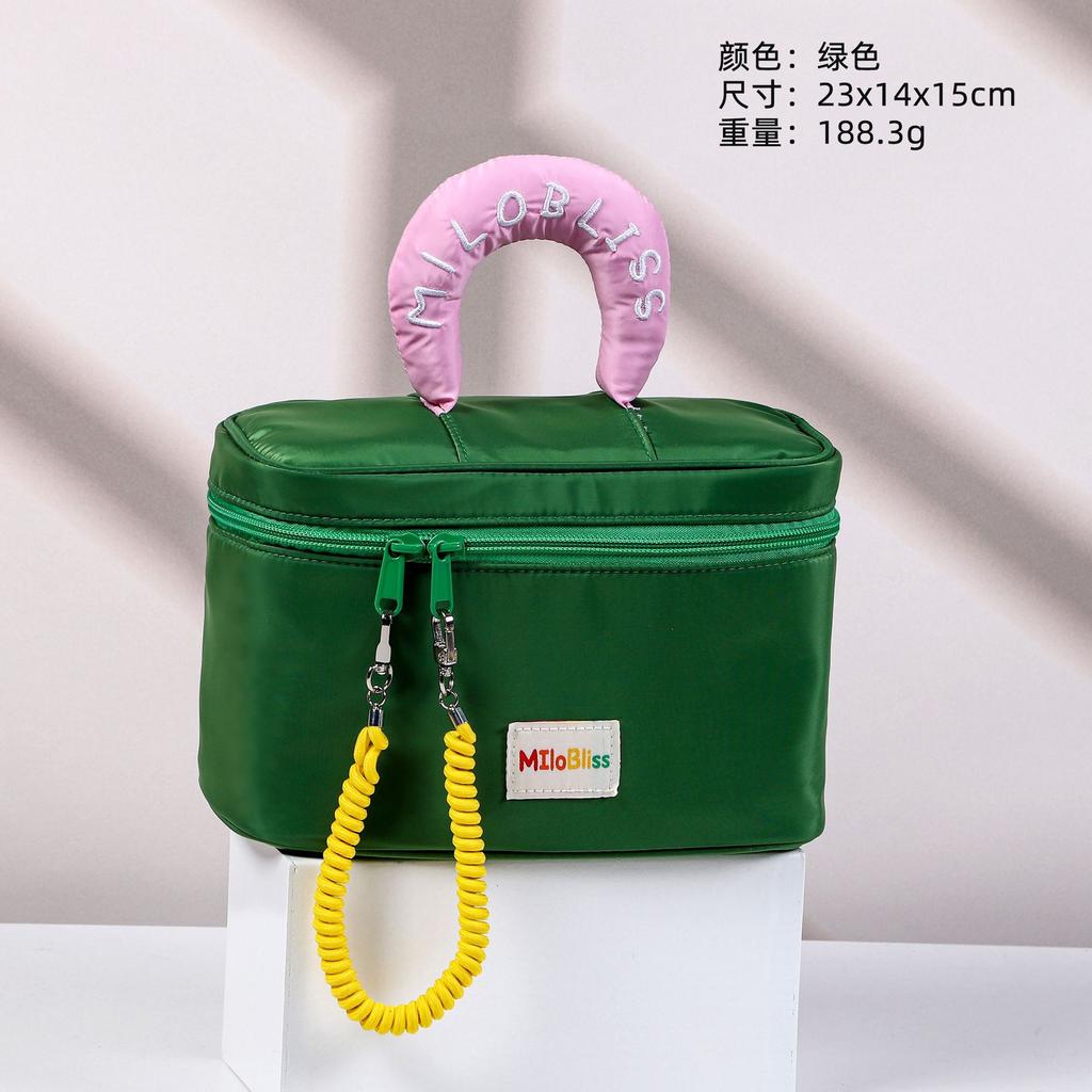 Cosmetic bag Large capacity cute contrasting color portable waterproof toilet bag Women's skin care product storage bag