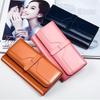 Women's Tri-Fold Genuine Leather Wallet: Large Capacity, Multiple Card Slots, Korean Style Coin Purse with Clasp.