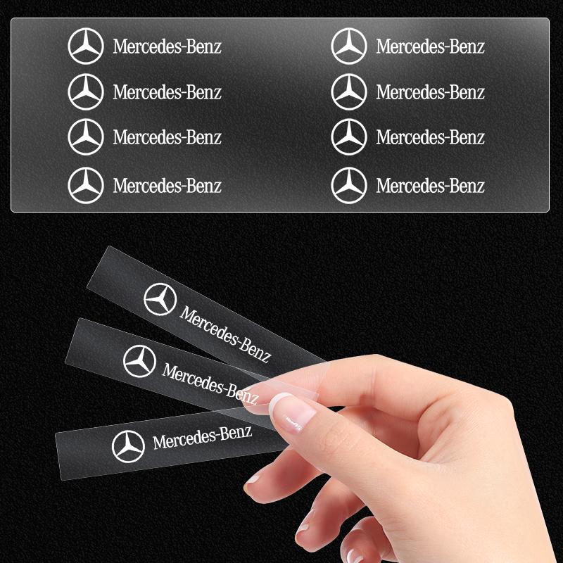 2/5/10 stk Bilinteriør Tilfeldige Klistremerker Bil Ratt Emblem Styling For Mercedes Benz AMG E200 E300 W205 W212 W166 W176 W242 S212 X166 W205 E63
