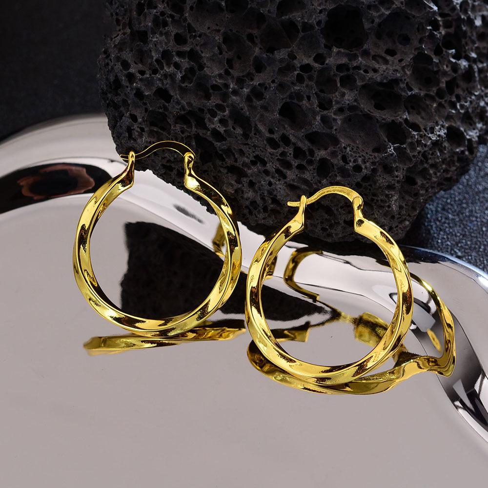 Золотые серьги Мебиус Женские Нишевые Скрученная текстура Темперамент Высококачественные Серьги-Застежки
