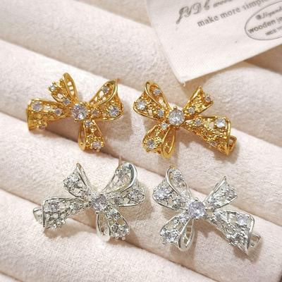 Copper Plated Hollow Bow Gold and Silver Zircon Stud Earrings - Retro Palace Style with Silver Needle Ornaments.