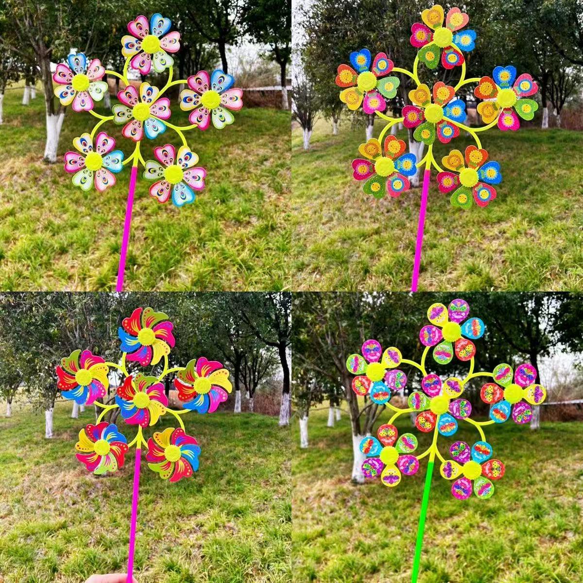 Красочная игрушка-ветряк с цветком и насекомым, с мультяшным смайликом, шесть колес - Идеально для живописных местностей и рынков под открытым небом