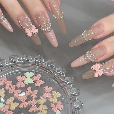 100Pcs Mix Cream Style Bowknot Nail Charms 3D Aurora Bow Flat-Back Gems Parts Nail Art Manicure Decorations