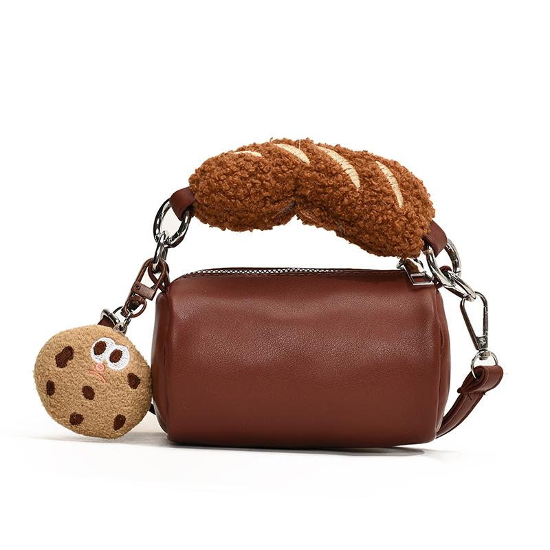 

2025 autumn and winter new niche ins premium texture mini hand carry cylinder bag trendy fashion versatile messenger bag коричневый