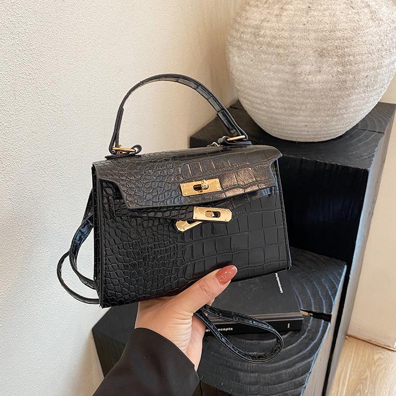 

Женская сумка 2025 новая сумка с узором под камень женское лицо на одно плечо сумка-мессенджер