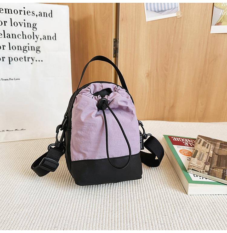 

Сумка-мессенджер бренда Tide, мужская и женская, для занятий спортом на открытом воздухе, с кулиской для девочек, затягивающаяся, с цветовой блокировкой, маленький рюкзак-ведро на одно плечо. фиолетовый