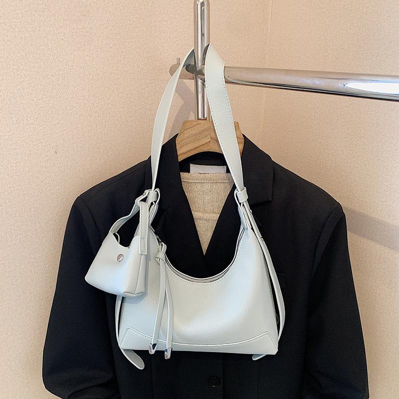 

Retro high-end underarm commuter bag women s 2025 new simple wide shoulder strap one-shoulder crossbody bag free coin purse синий