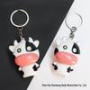 LED Sounding Cow Keychain Pendant - Cute and Luminous Cartoon Bag Accessory