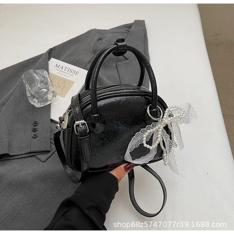 Korean Version of Ins Fashion Hand-held Bowling Bag Women's 2025 Simple and Versatile Shoulder Bag High-end Casual Crossbody Bag