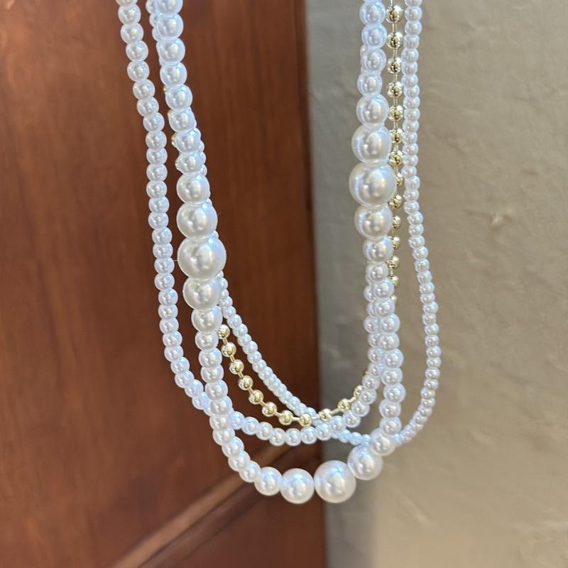 

Premium multi-layer baroque pearl necklace collarbone chain retro light luxury niche neck chain exaggerated autumn and winter accessories women