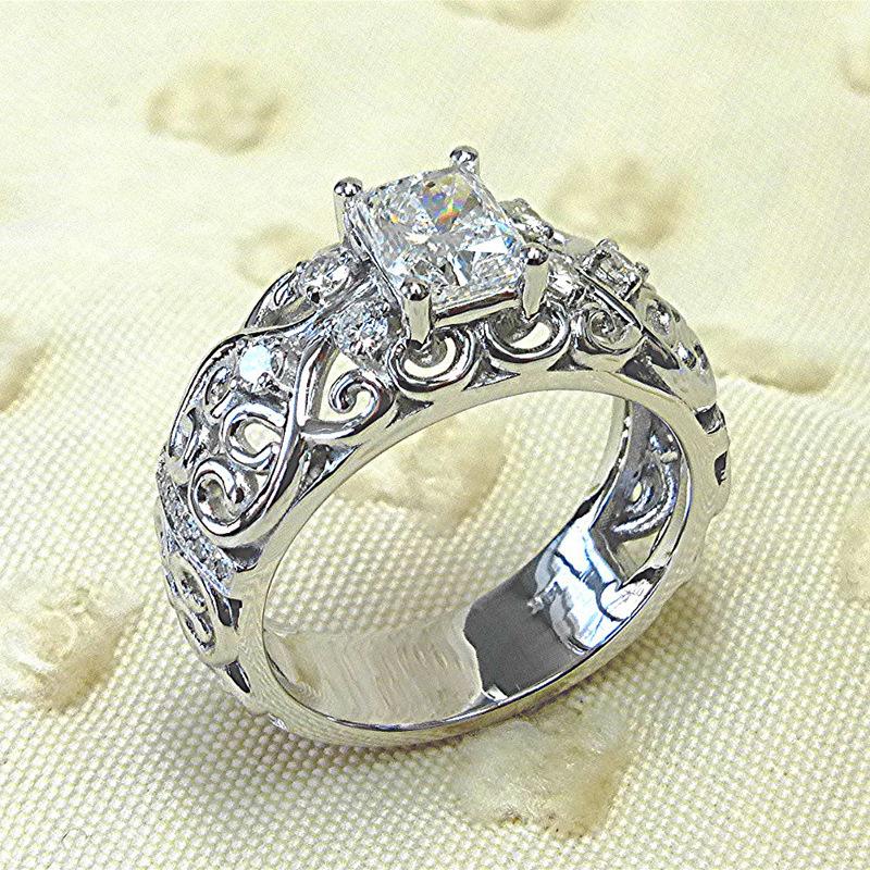 Retro court style jewelry, new pattern hollow flower ring, creative personalized zircon women's ring
