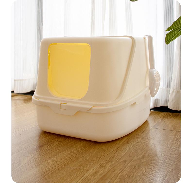 Uzavřená kočičí toaleta s odklápěcím víkem, deodorizační funkcí a lopatkou, odolná proti stříkající vodě a nadměrně velká pro snadné čištění