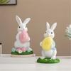 Handcrafts Resins Easters Bunnies Holding Eggs Decoration Cute Rabbit Figurine with Lawn Base for Home and Office Decors