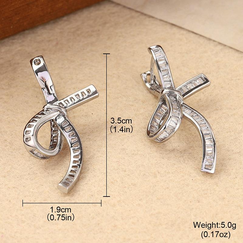Light luxury bow earrings women s zircon ear earrings three-dimensional design advanced sense versatile commuter niche stud earrings summer