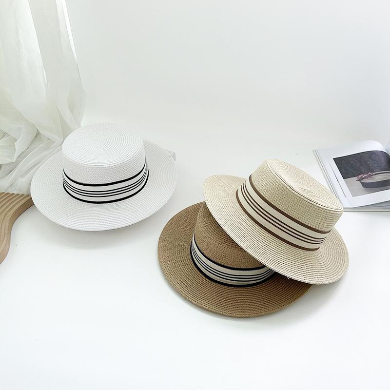 Flacher gestreifter gewebter Strohhut für Damen im Sommer Neu Koreanischer Promi Instagram Neuer Sonnenschutzhut für Urlaub und Ausflug