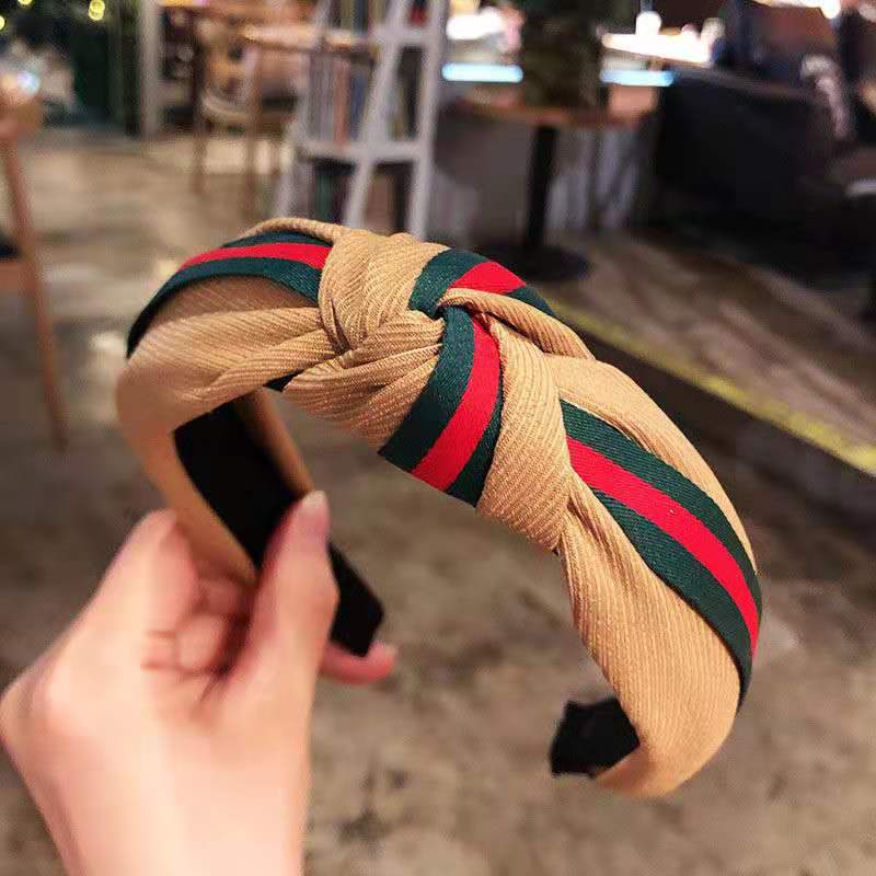 Fabric headband female Yiwu headdress jewelry autumn and winter feeling wide edge versatile high skull top headband hairpin